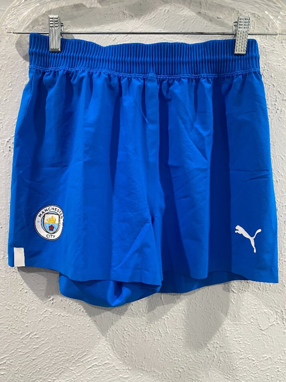 Puma, Manchester City, NWT, Wigan soccer shorts, women's size S, in royal blue.